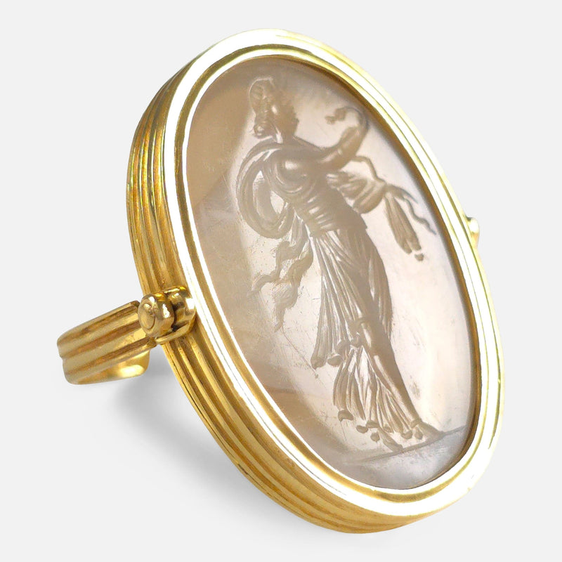 the ring viewed from the left side with Hygieia engraving in focus