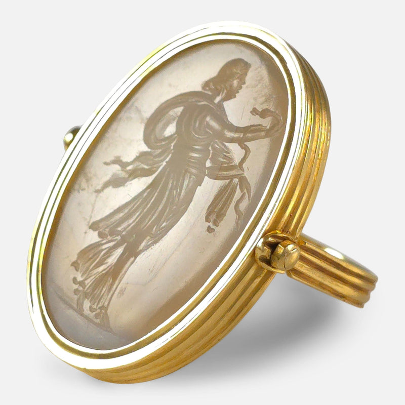 the ring rotated to see the engraving of Hygieia, the goddess of health, holding a snake