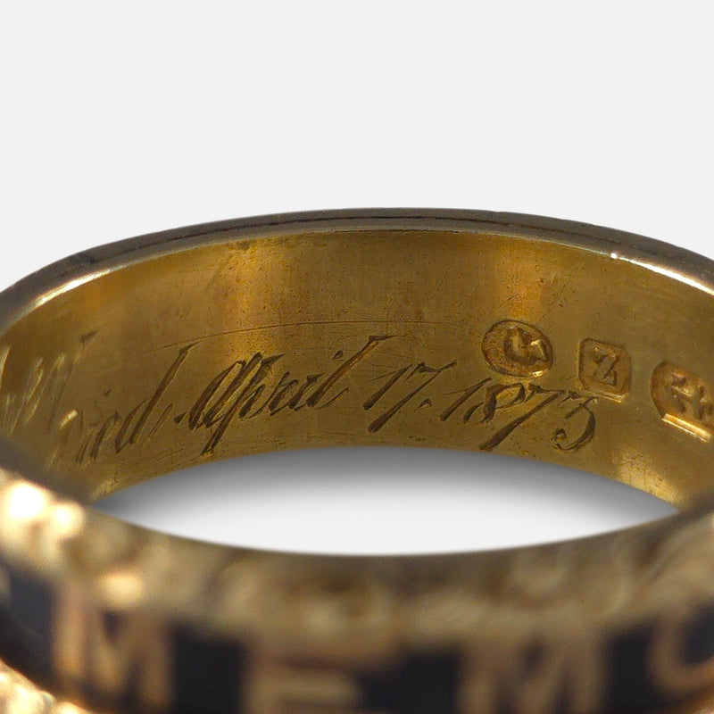 part of the inscription to the inside of the ring in focus