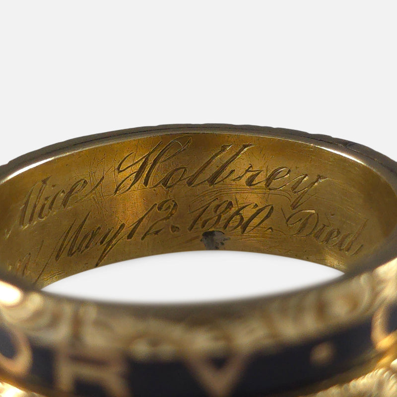 part of the inscription to the inside of the ring in focus